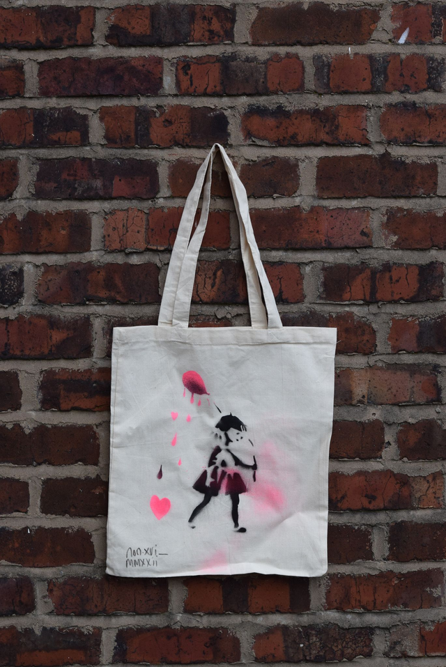 Fabric bag with spray