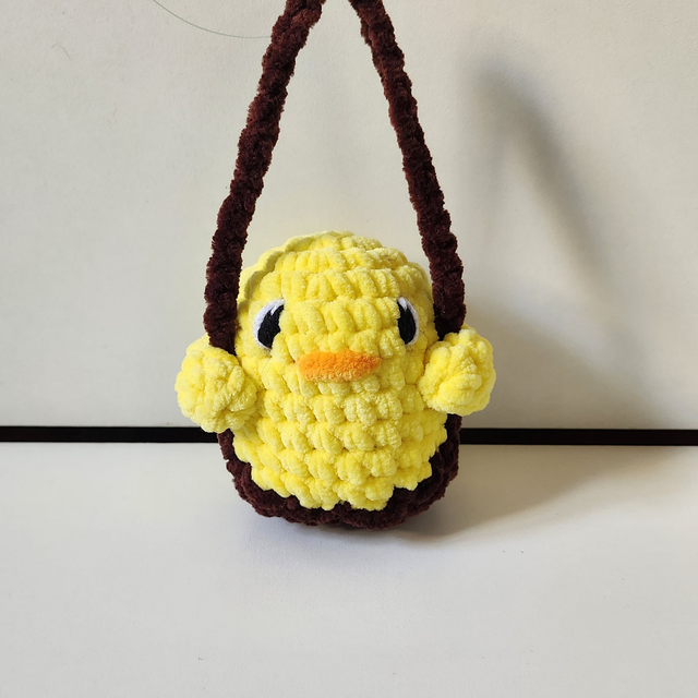 Attache rétroviseur poussin