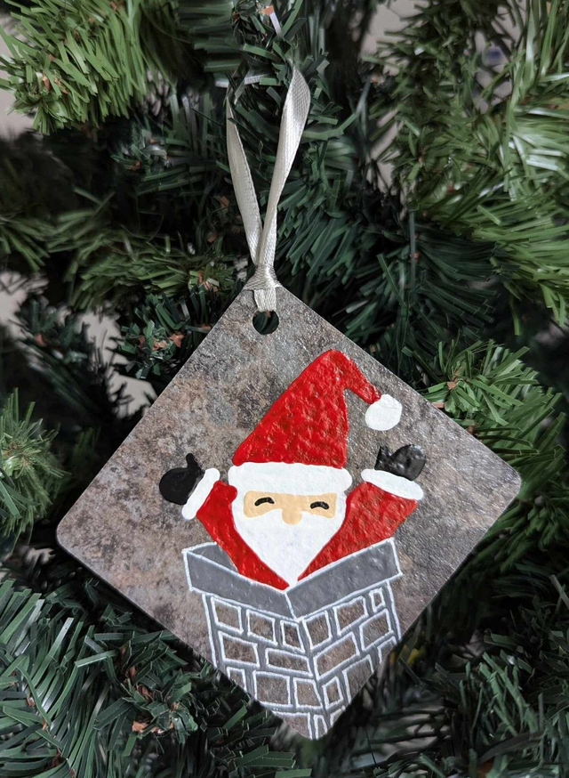 Père Noël dans la cheminée 2024