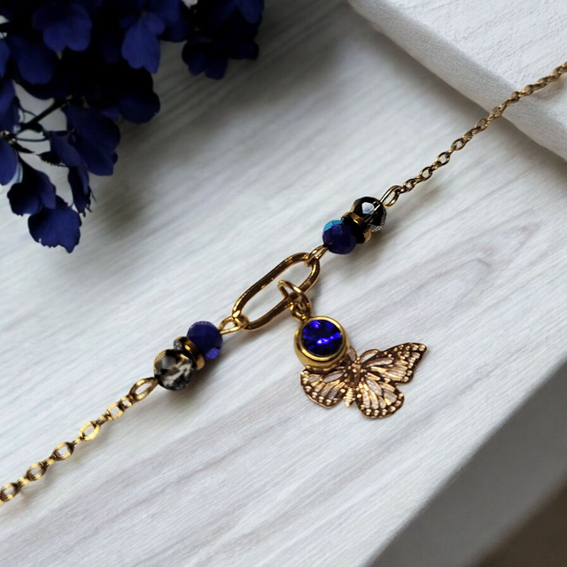 Bracelet acier inoxydable et strass bleu foncé et doré