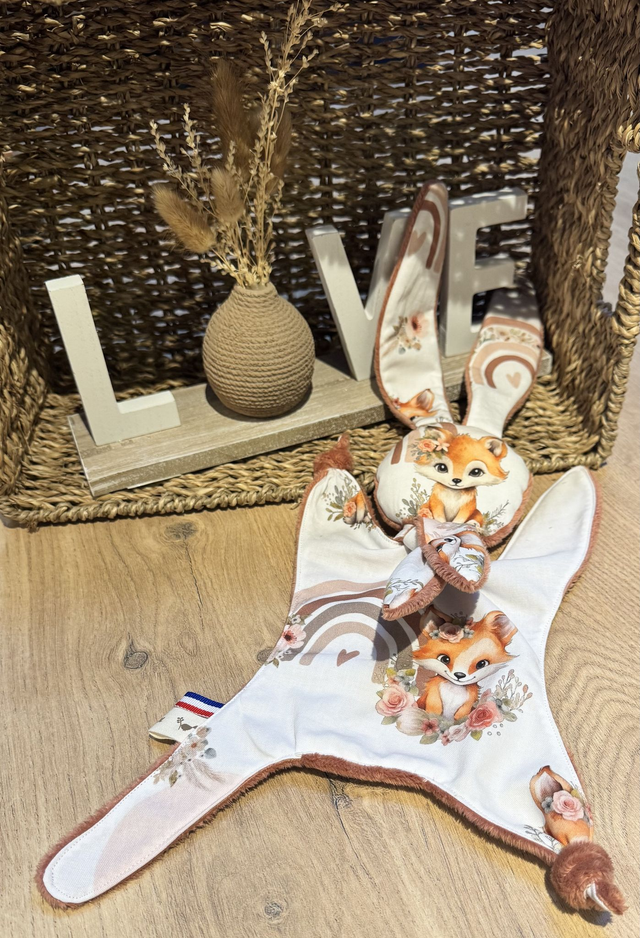 Doudou renard arc en ciel