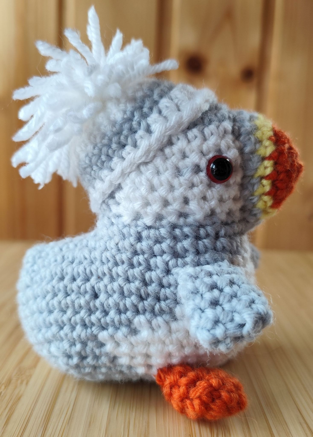 Waldo, the white puffin with grey and white hat, small size (made from merino wool yarn)