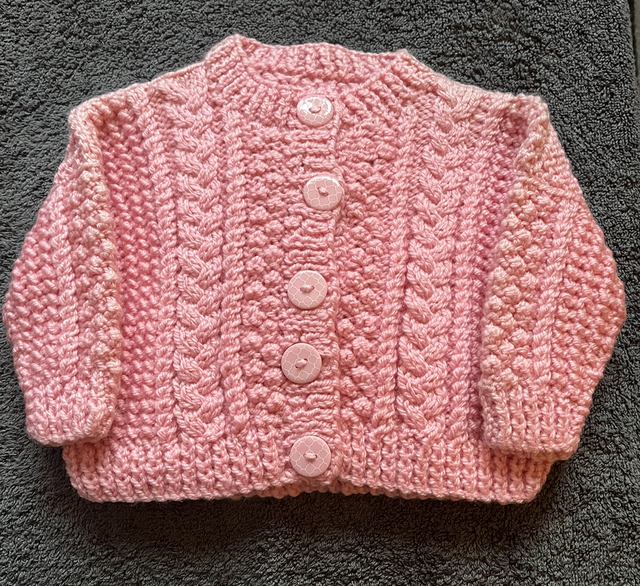 Pink Aran cardigan 3-6months 
