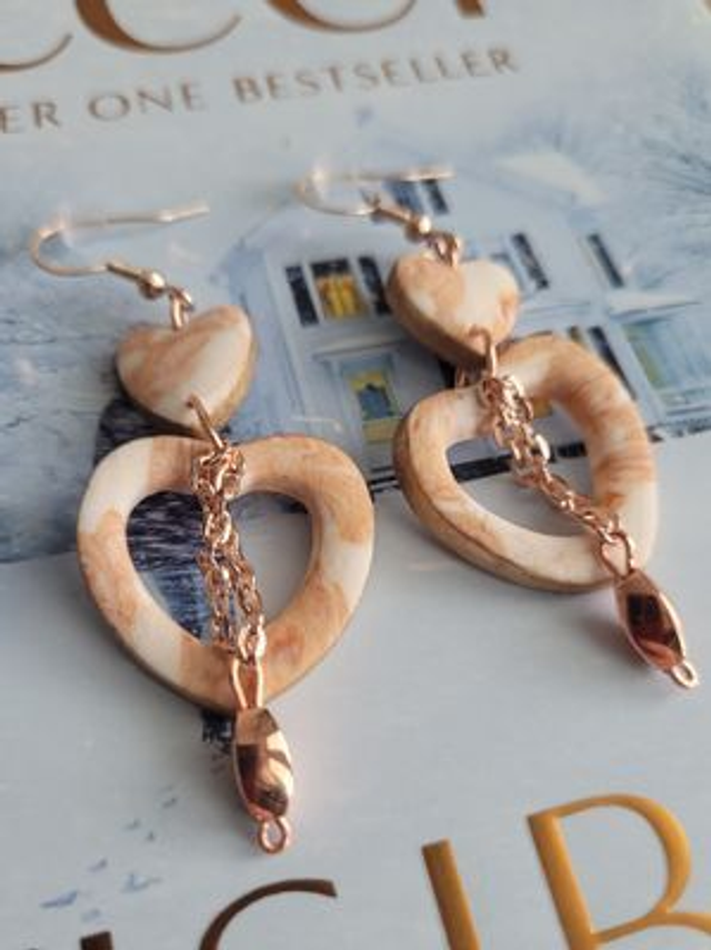 Drop earrings: Heart cut out rose gold design