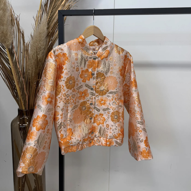 Bloemenprint jasje oranje 