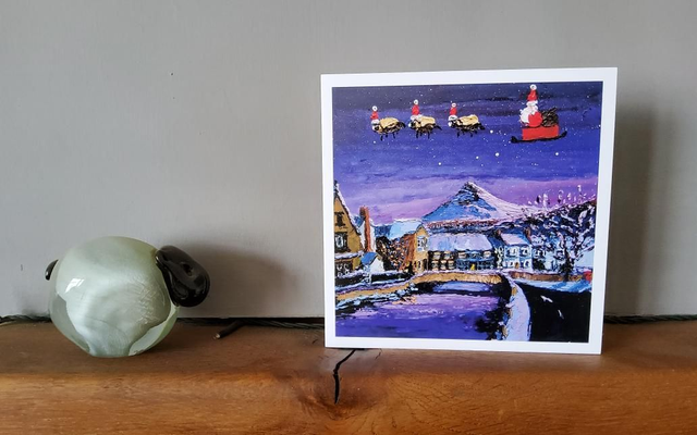 Father Christmas and his Christmas sheep flying over Great Ayton and Roseberry Topping. 6x6" christmas card. 