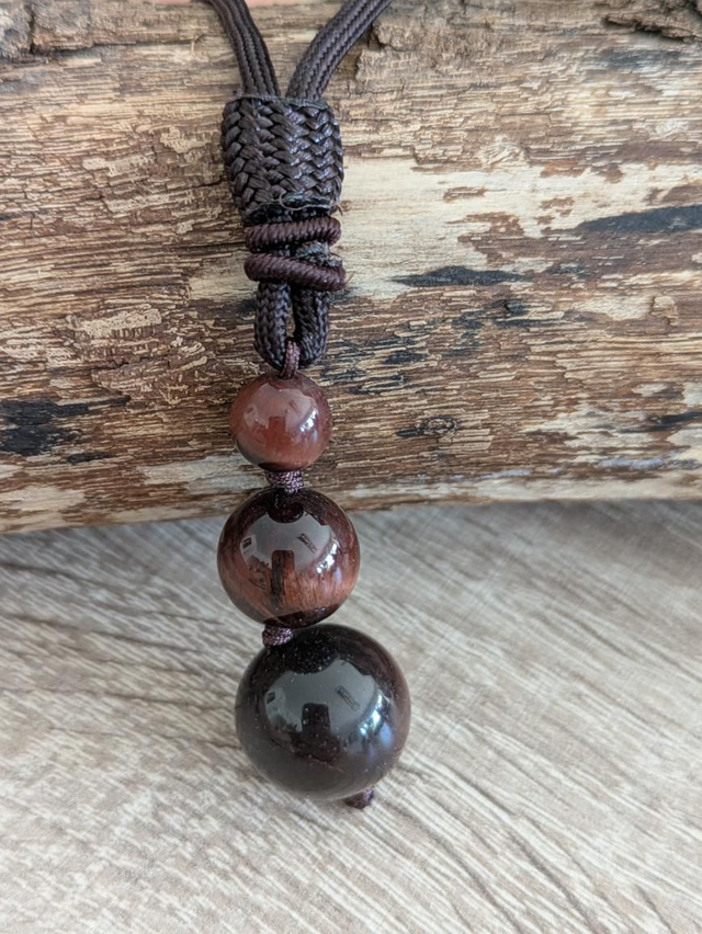 Pendentif perles oeil de taureau 