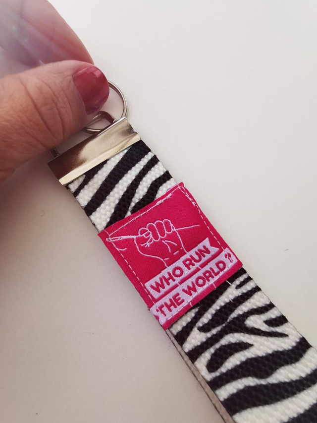 Porte-clefs CHARLIE who run the world