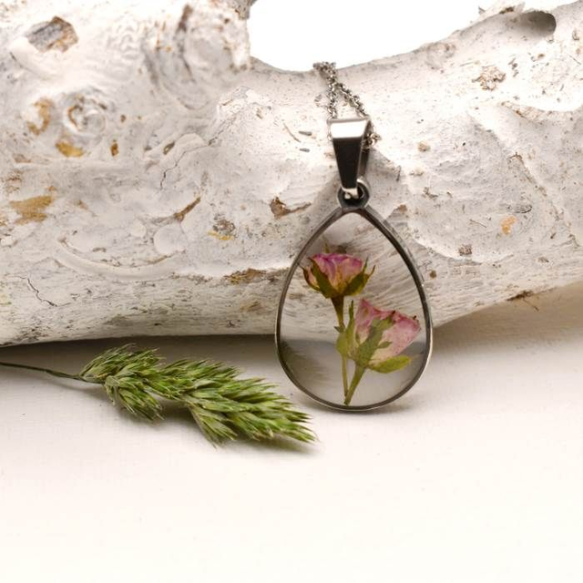 Tiny pink rosebuds in drop pendant