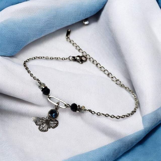 Bracelet acier inoxydable et strass bleu pétrole et argenté