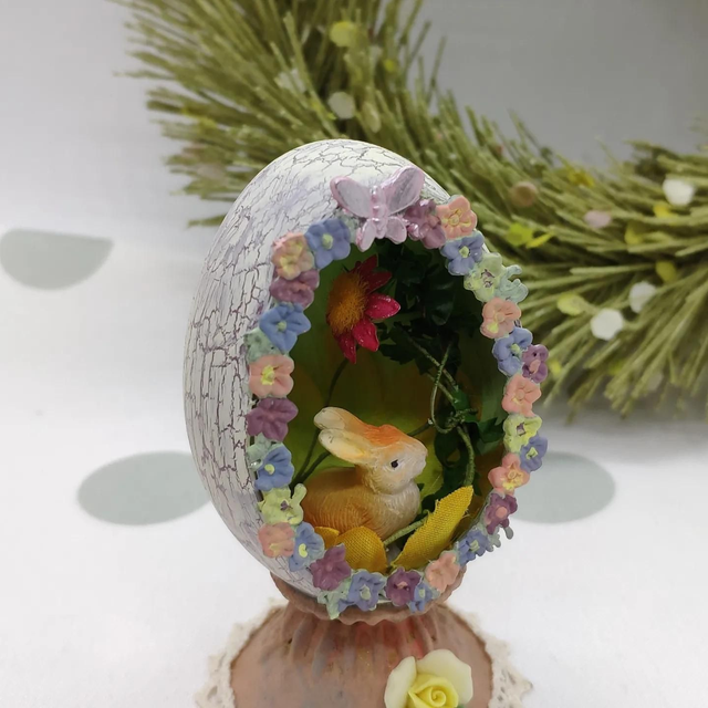 Tiny bunny in a Duck egg with metal stand