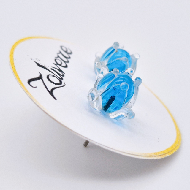 Puces d'oreilles - Clochettes bleues transparentes