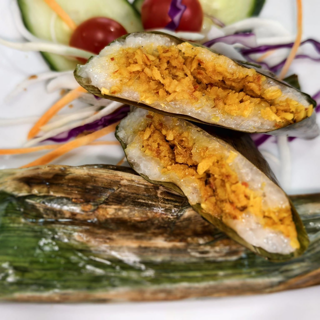Home made Pulut Panggang (2 glutinous rice wrap with spicy sambal filling in banana leaf)
