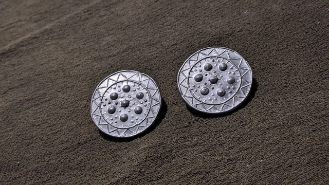 Chunky Coppergate pewter brooch pair