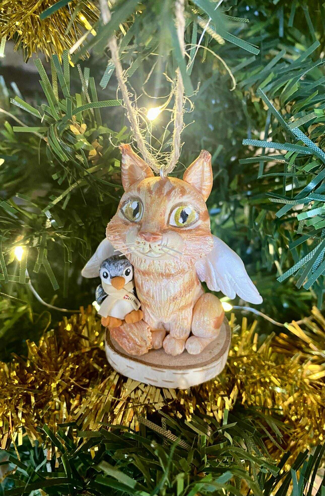 Figurine ailée à suspendre