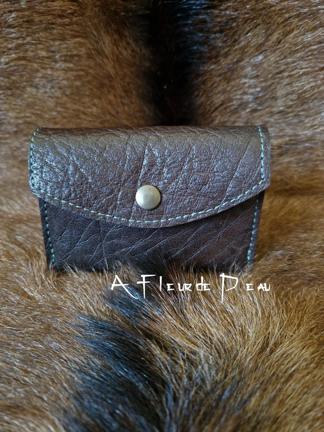 Porte monnaie cuir 3 compartiments.