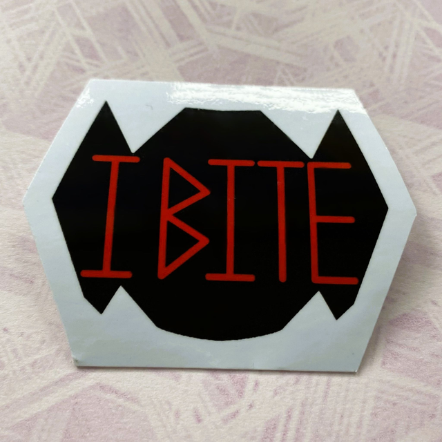 M: I bite (laminated sticker)