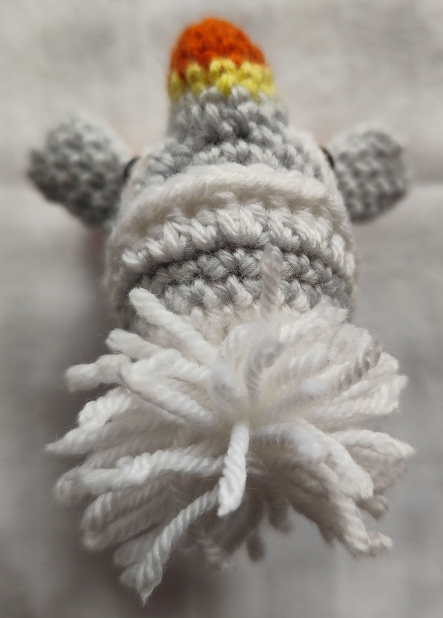 Waldo, the white puffin with grey and white hat, small size (made from merino wool yarn)