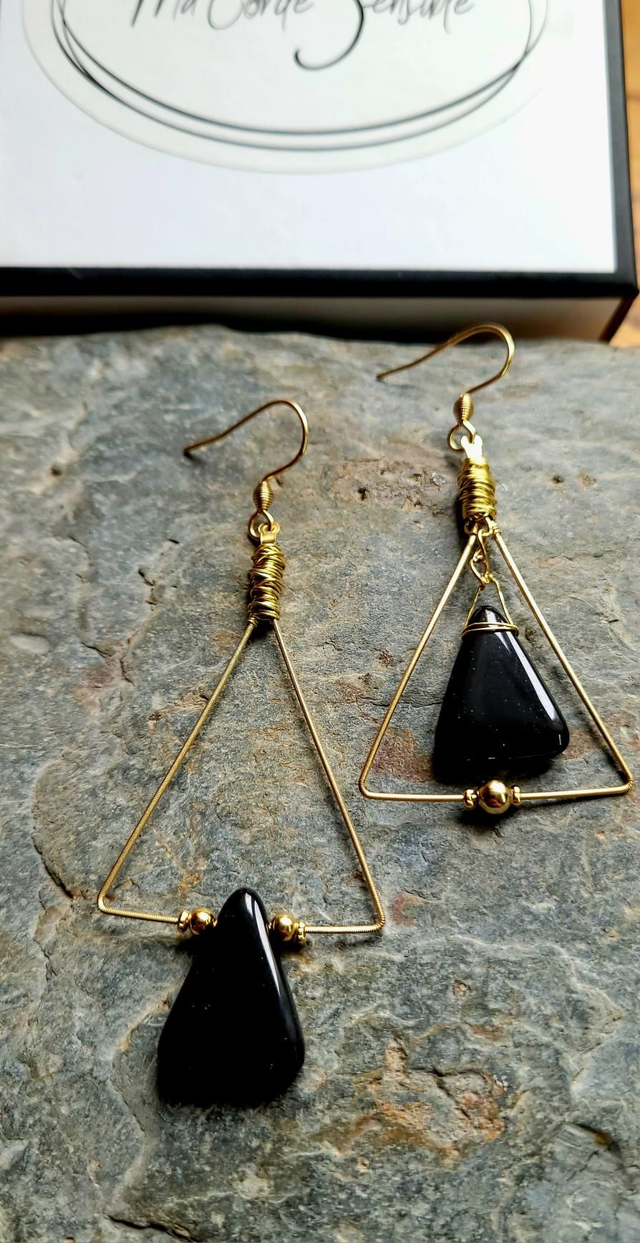 Boucles asymétriques corde de guitare surcyclée 