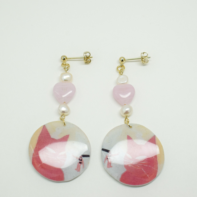 Pink cat with pink heart