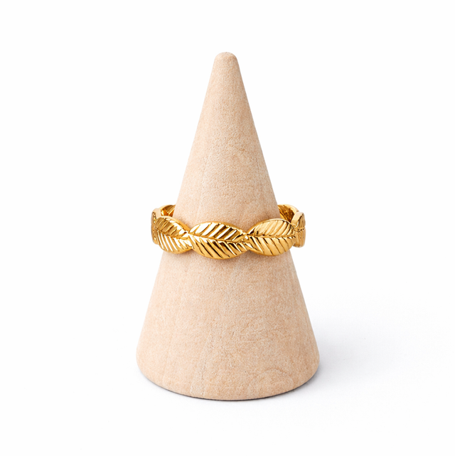 Anillo acero dorado hojas 