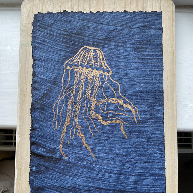 Gold Compass Jellyfish on Indigo washed cotton rag paper