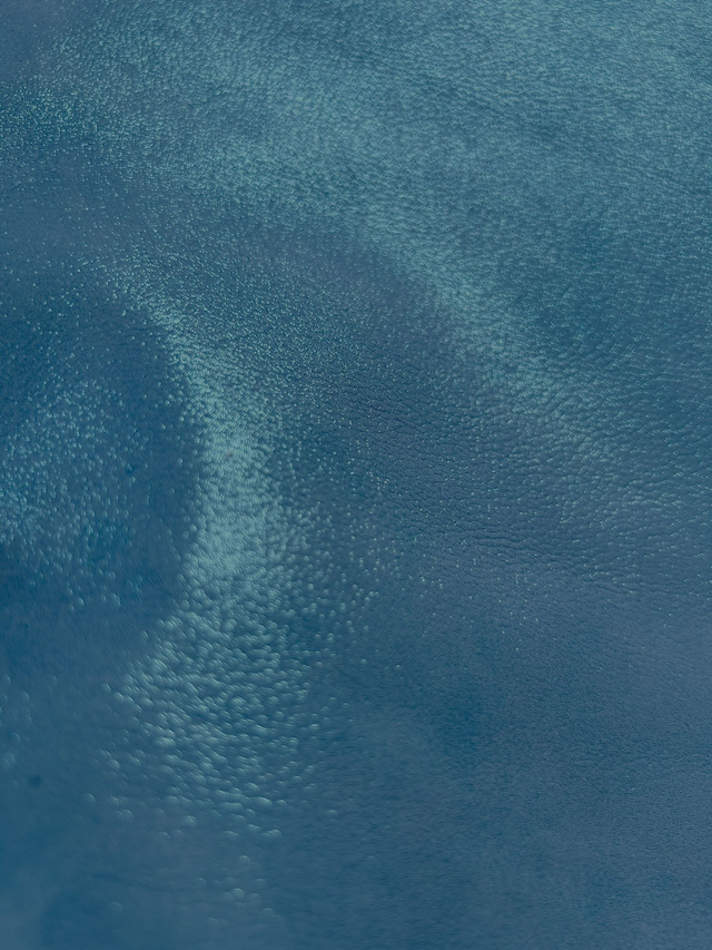 Chute de cuir turquoise pailleté 