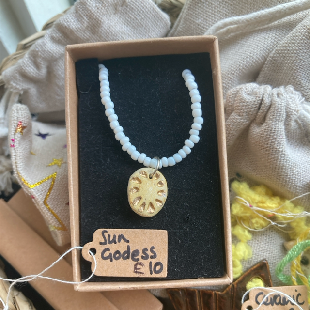 Small clay sun goddess