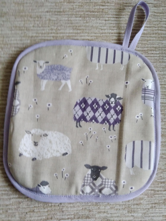 Hot Pot Grab Mat, Handmade. Baa Baa Lavender Sheep patterned fabric. Hanging Loop Terry Towel backing