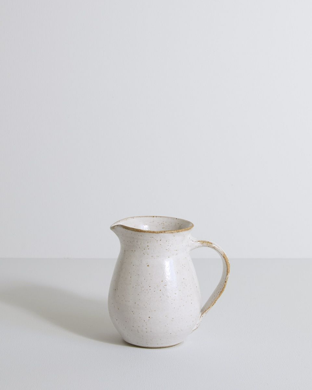 Speckled jug in white