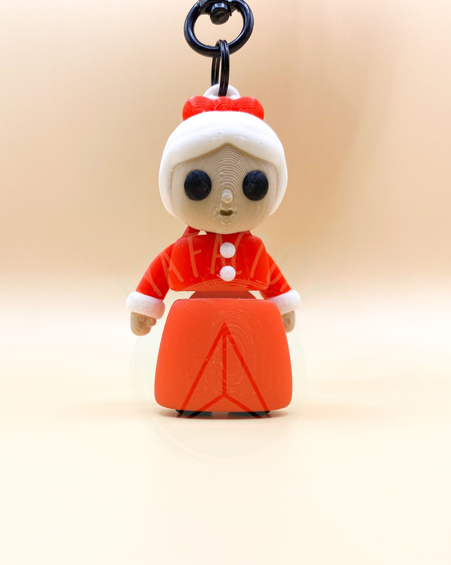 Porte-clés mini Mère Noël articulée