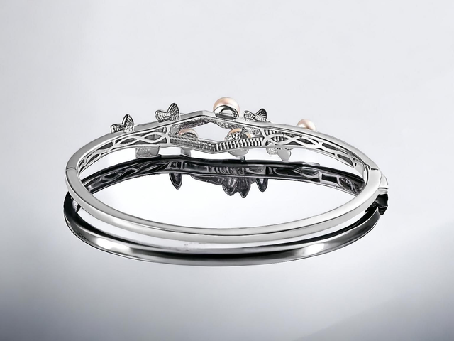 Natural Freshwater Pearls & Platinum Plated Bangle.