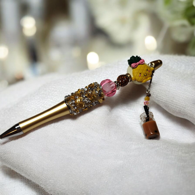 Stylo perles jaune marron