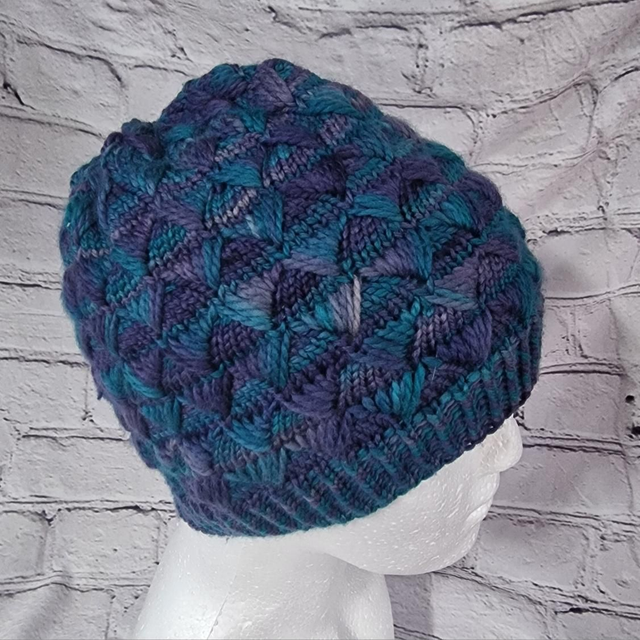 Hand dyed feather look hat