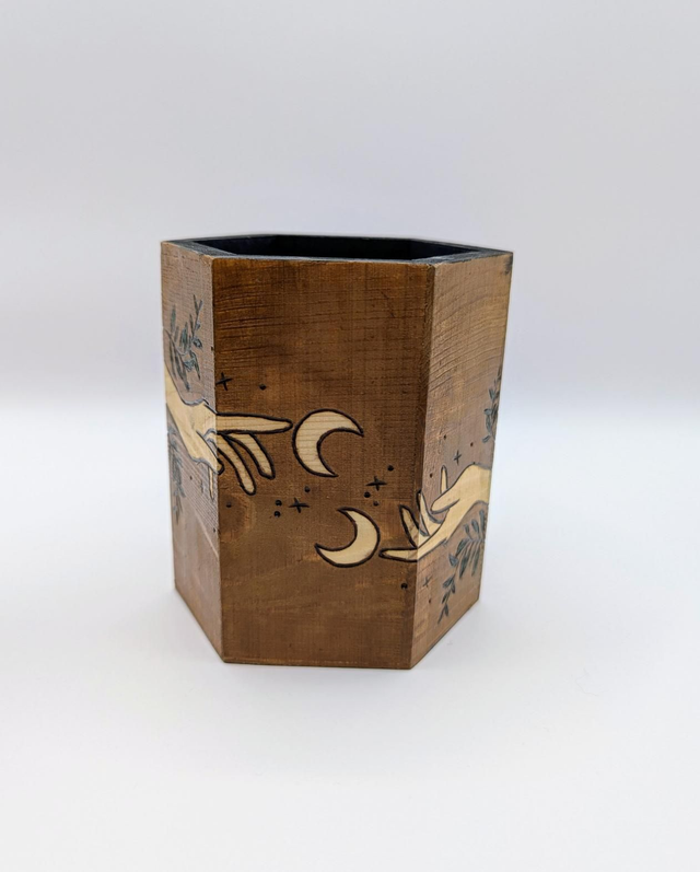 'Passing through the night' pen holder