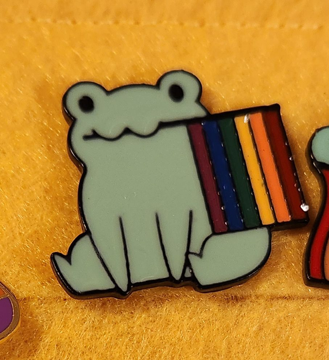 Frog With Flag In Mouth