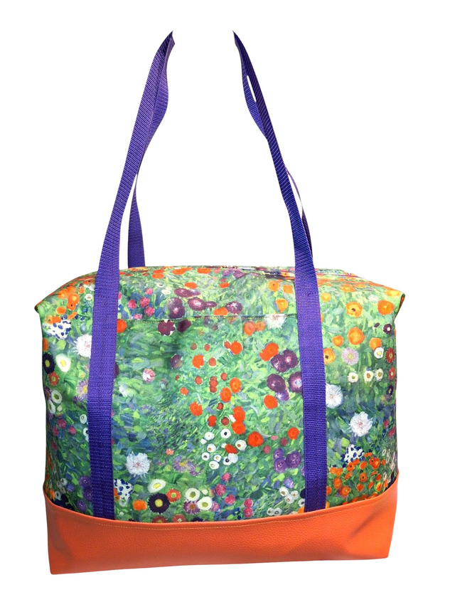 Water resistant holdall with orange vinyl base and meadow flower fabric