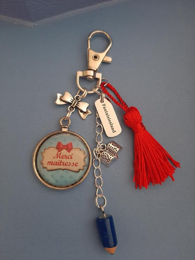 Bijou de sac Merci Maîtresse - bleu rouge