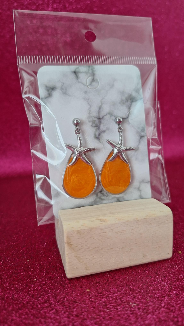 Boucles d&#039;oreilles Étoiles argentées/ orange 