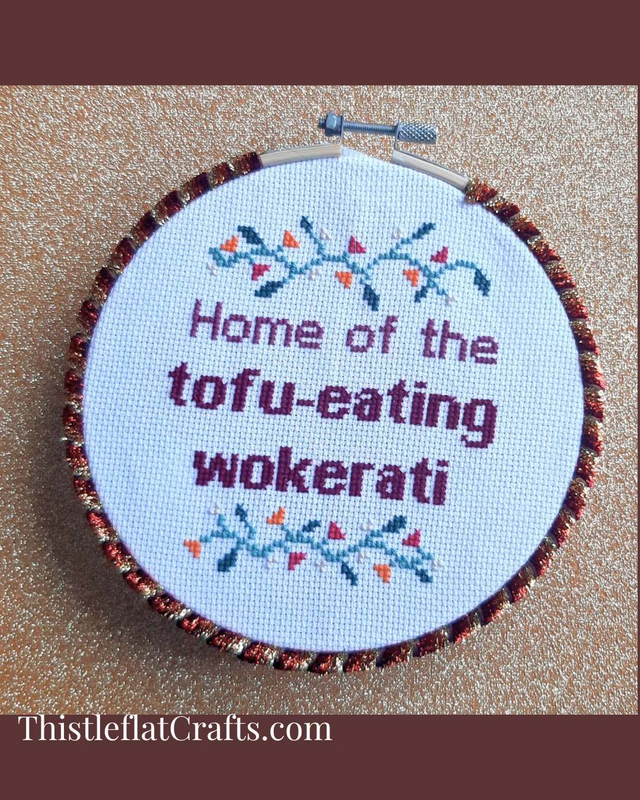 Home of the wokerati, completed cross stitch