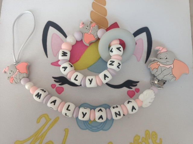 1 Attache tétine + 1 Anneau de dentition Dum