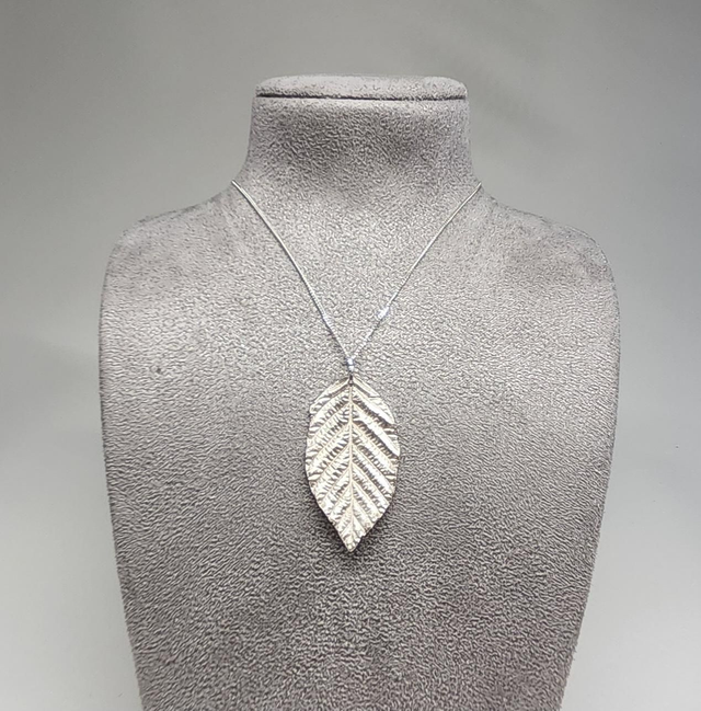 Hornbeam leaf pendant on silver necklace