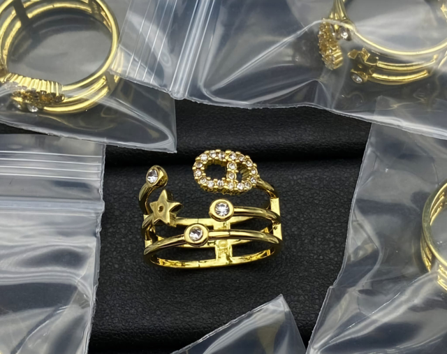 Bague CD doré avec strass