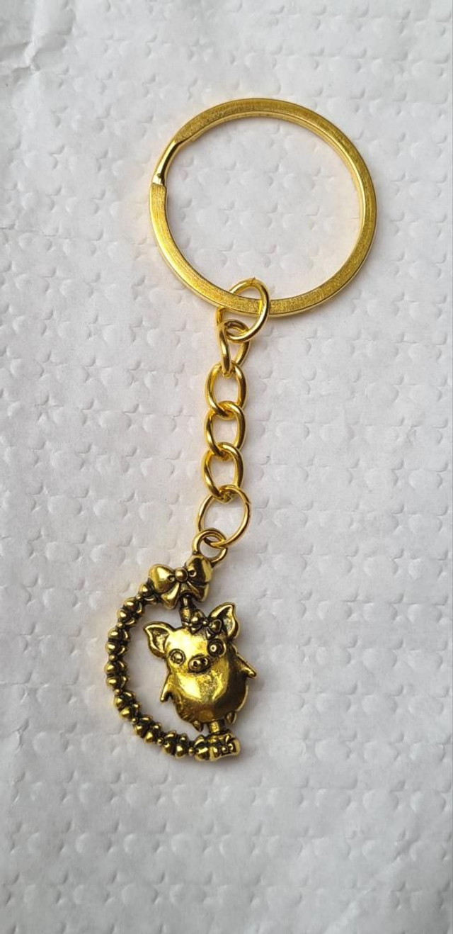 Keyring / bag charm gold pig fidget spinner