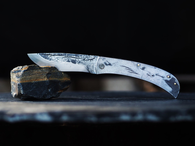 Couteau pliant en fer