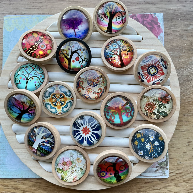 Handmade glass brooch with printed design. Clothes accessories.