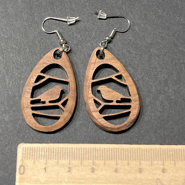 Les boucles en noyer 