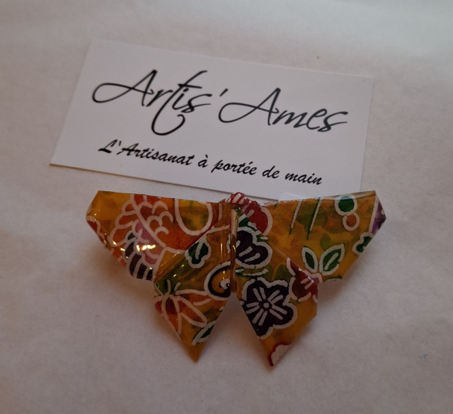 Barrette Papillon jaune orangé / bleu