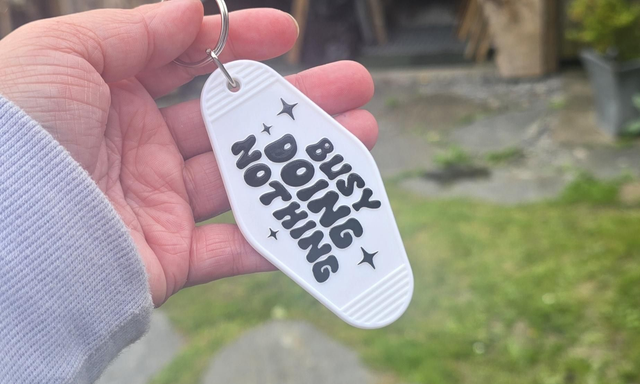 Busy Doing Nothing Motel Keyring
