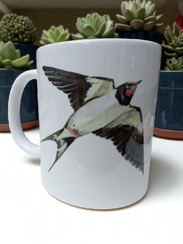 ' Swallow ceramic mug '